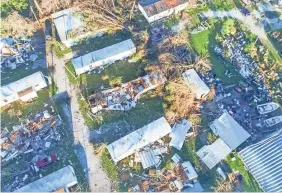  ??  ?? Drone photos show damage caused by Hurricane Michael in Panama City. Residents have been told they can start returning home.