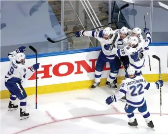  ?? Getty imaGes File ?? BOOKING THEIR TICKET: The Lightning are going to the Stanley Cup after beating the Islanders 2-1 in overtime of Game 6 of the East Finals last night.