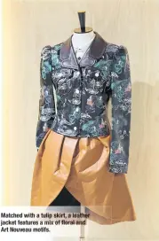  ??  ?? Matched with a tulip skirt, a leathe jacket features mix of floraland Art Nouveau motifs.