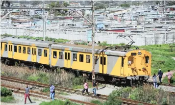  ?? PICTURE: HENK KRUGER/AFRICAN NEWS AGENCY (ANA) ?? SLOW PROGRESS: Transport Minister Blade Nzimande says the Passenger Rail Agency of SA has been so dogged by past problems that it has been unable to look to the future.