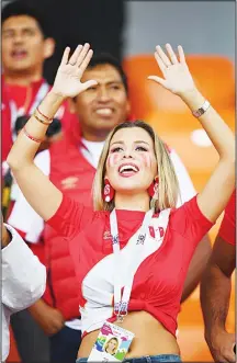  ?? (AFP) ?? A Peruvian fan cheers ahead of the Russia 2018 World Cup Group C football match between France and Peru at the Yekaterinb­urg Arena in Yekaterinb­urg on June 21.