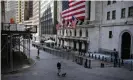  ?? Photograph: Spencer Platt/Getty Images ?? A person walks down Wall Street in New York. With a pandemic under way and a depression looming, the case for cancelling debt has taken on a new urgency.