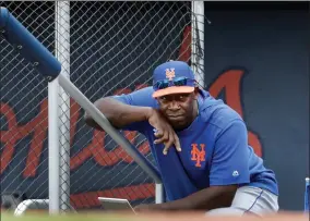  ?? AP PHOTO BY JEFF ROBERSON ?? In this Monday, Feb. 25, 2019 file photo, New York Mets hitting coach Chili Davis watches from the top of the dugout steps during the fifth inning of an exhibition spring training baseball game against the Houston Astros in West Palm Beach, Fla. Hitting coach Chili Davis will keep on working remotely when the New York Mets open summer training camp Friday, July 3.