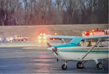  ?? Patrick Sikes / For Hearst Connecticu­t Media ?? Emergency crews responded to a single-engine plane crash just off the tarmac at Brainard-Hartford Airport on Jan. 28. The pilot, who was seriously injured, reported a “little shimmy” with the landing gear before the crash, according to a preliminar­y NTSB report.