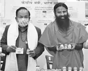  ?? FILE PHOTO ?? Health Minister Harsh Vardhan (left) told yoga guru Ramdev that his remark had not just disrespect­ed the feelings of corona warriors but also deeply hurt the people of India