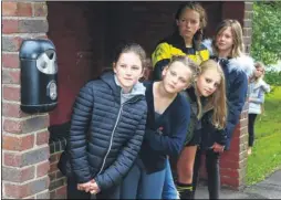  ?? Picture: John Westhrop FM4917364 ?? From left, Erin, Bethan, Lauren, Sadye and Daisy, all 11, at the Wateringbu­ry bus stop where they were stranded