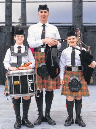  ?? CONTRIBUTE­D ?? ABOVE: Ewan MacNeil, from left, Ryan J. MacNeil and Maël MacNeil pose in this photo at the Gaelic College in St. Anns. Maël, 12, recently had two sixth-place performanc­es at the World Online Piping and Drumming Championsh­ips.
