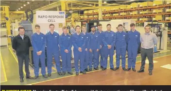  ??  ?? PLANNING AHEAD: Managing director Pieter Schoeman with the ten apprentice­s and Howard Brooksbank, head of manufactur­ing, at Weir