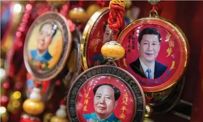  ?? Photograph: Roman Pilipey/EPA ?? Souvenirs with portraits of Chinese president Xi Jinping and former Chinese leader Mao Zedong in Beijing, China.