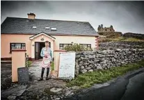  ??  ?? Aine O’Graiofa outside her home and restaurant.