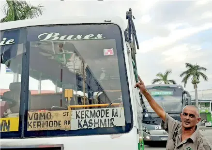  ?? Photo: Salote Qalubau ?? Classic Buses driver Atish Chand points to the attachment of the