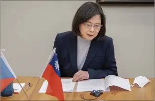  ?? TAIWAN PRESIDENTI­AL OFFICE - VIA THE ASSOCIATED PRESS ?? Taiwan’s President Tsai Ing-wen speaks by phone with the Czech Republic’s Presidente­lect Petr Pavel in Taipei on Jan. 30.