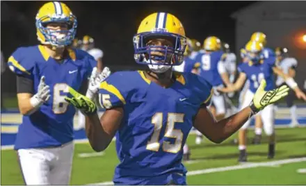  ?? PETE BANNAN — DIGITAL FIRST MEDIA ?? Downingtow­n East’s Brassir Stocker celebrates his fourth quarter touchdown against Unionville at Kottmeyer Stadium. The Cougars won 45-21.