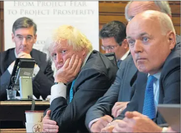  ??  ?? Iain Duncan Smith with Boris Johnson and Jacob Rees Mogg at the 2018 launch of A World Trade Deal in London