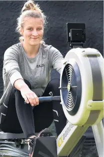  ?? PHOTO: PETER MCINTOSH ?? Heading off . . . Eva Hofmans on her rowing machine at home.