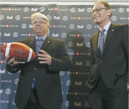  ?? JACK BOLAND / POSTMEDIA NEWS FILES ?? When the Argos finally hired GM Jim Popp, left, and head coach Marc Trestman in February, the franchise’s preparatio­n for the coming season was three months behind schedule. Now the team is a win away from the Grey Cup.