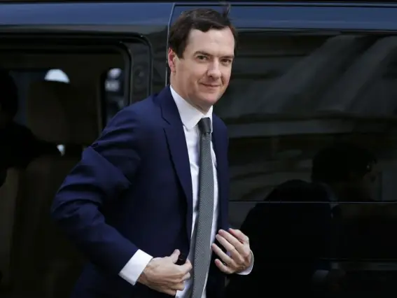  ?? (AFP/Getty) ?? The Commons Public Administra­tion and Constituti­onal Affairs Committee said Mr Osborne had set an ‘unhelpful example’ in taking the job of editor at the newspaper
