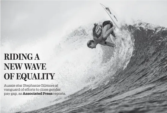  ?? TOM SERVAIS / AGENCE FRANCE-PRESSE ?? Australia’s Stephanie Gilmore rides the waves at a competitio­n in Tavarua, Fiji last year. The seven-time world champion has been at the forefront of a successful push to secure equal pay for women on her tour, the World Surf League.