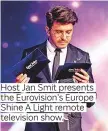  ??  ?? Host Jan Smit presents the Eurovision’s Europe Shine A Light remote television show.