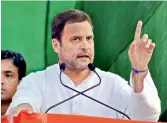  ?? — PTI ?? Congress Vice-president Rahul Ghandhi addresses an election rally at Nagrota in Kangra on Monday.