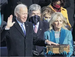  ?? PHOTO: GETTY IMAGES/TNS ?? Far from radical . . . Joe Biden is sworn in as United States president during his inaugurati­on in Washington yesterday.