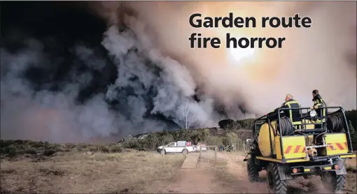  ?? PICTURE: EWALD STANDER / AP ?? RING OF FIRE: Firefighte­rs battle a blaze in the Kranshoek in the Western Cape on Wednesday. Fires fanned by high winds swept through the scenic coastal town of Knysna, killing several people, destroying homes and forcing the evacuation of up to 10 000...