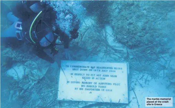  ??  ?? The marble memorial placed at the crash site in Greece