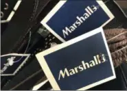  ?? ELISE AMENDOLA — THE ASSOCIATED PRESS ?? Marshalls tags are attached to merchandis­e in a store in Methuen, Mass.