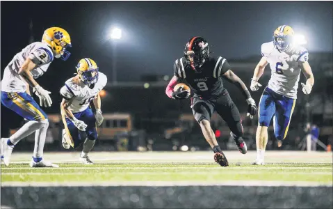  ?? NATE HECKENBERG­ER — FOR MEDIANEWS GROUP ?? Coatesvill­e’s Abdul-Sabur Stewart picks up yards before being tackled by Downingtow­n East’s Cannon Lucas-Murphy Friday night.