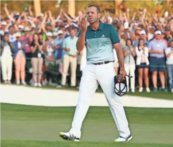  ?? ROB SCHUMACHER, USA TODAY SPORTS ?? Sergio Garcia blows kisses to the crowd after his birdie on the playoff hole won the Masters.