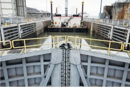  ?? STAFF FILE PHOTO ?? A door of the functionin­g lock is seen at the Chickamaug­a Dam.