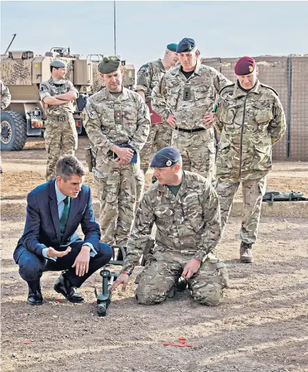  ??  ?? Gavin Williamson, the Defence Secretary, visited British troops stationed in Taji, Iraq and praised their contributi­on to the war on terrorism