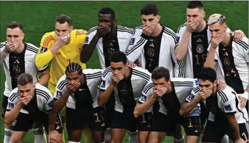  ?? PIC: GETTY IMAGES ?? Protest: Germany players protest before their World Cup opener against Japan