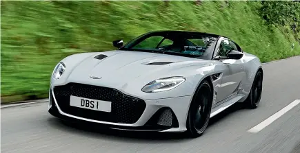  ??  ?? Eyes front: The DBS picks up a lot of styling detail from the Vulcan track car. It is supposed to look aggressive but not ‘‘squinty’’, according to Aston Martin.