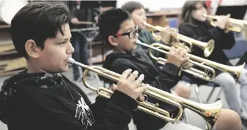  ?? ?? Photo Courtesy of District One
Music education isn’t a part of school to overlook. Kids who study instrument­s in school can benefit from practicing regularly at home.