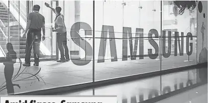  ?? ED JONES, AFP/ GETTY IMAGES ?? Samsung shares on Tuesday plunged 8%, wiping nearly $ 20 million off its value in the biggest percentage drop in one day since 2008, and slipped another 0.8% Wednesday.