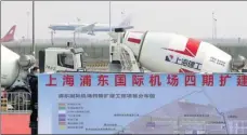  ?? GAO ERQIANG / CHINA DAILY ?? The fourth phase expansion of Shanghai Pudong Internatio­nal Airport is among the 10 transport-related projects that started work on Tuesday in Shanghai’s Pudong New Area.