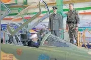  ?? AFP ?? President Hassan Rouhani at the cockpit of Kowsar fighter jet.