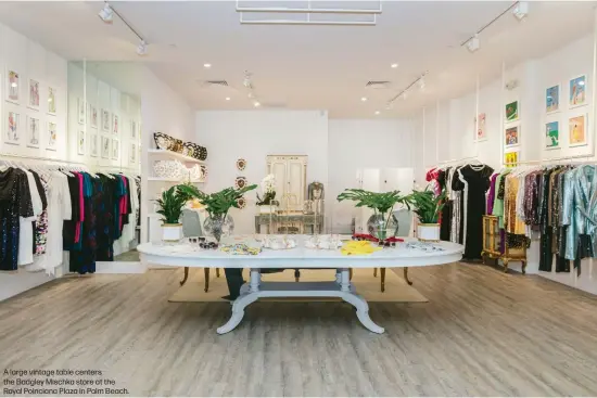  ??  ?? A large vintage table centers the Badgley Mischka store at the Royal Poinciana Plaza in Palm Beach.