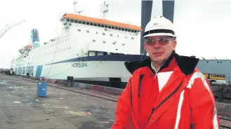  ??  ?? IMPROVEMEN­T WORK: Arie Van Loo, technical superinten­dent for P&O North Sea Ferries, oversees the refurbishm­ent work on the ferry the Norsun in 1997, which was in the dry dock at the Europoort terminal near Rotterdam.