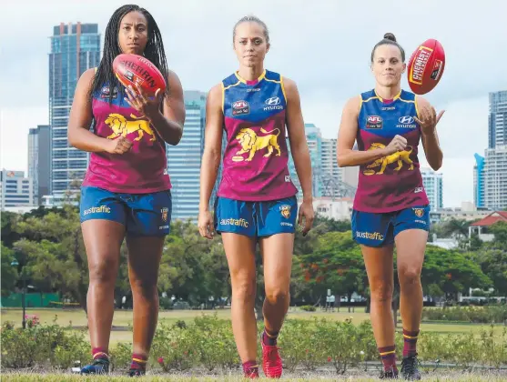  ?? HERE US ROAR: Brisbane AFLW players Sabrina Frederick, Kaitlyn Ashmore and Emma Zielke at New Farm Park, Brisbane. Picture: LIAM KIDSTON ??