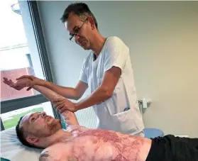  ??  ?? Road to recovery: Franck Dufourmant­elle having physio yesterday