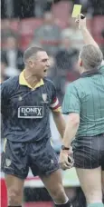  ?? PICTURES: PA ?? Vinnie Jones, main; with his wife Tanya on their wedding day, top; receiving a yellow card while playing for Wimbledon in 1994, above