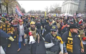  ?? (AP/Luis M. Alvarez) ?? Supporters of President Donald Trump, some wearing attire associated with the Proud Boys movement, join a rally Saturday at Freedom Plaza in Washington. Multiple groups of his supporters held rallies across the nation’s capital.
