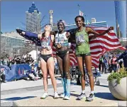  ?? PHOTOS BY HYOSUB SHIN / HYOSUB.SHIN@AJC.COM ?? Molly Seidel (left), Aliphine Tuliamuk and Sally Kipyego will represent the U.S. at the Tokyo Summer Olympics after Saturday’s U.S. Olympic Team Trials Marathon in Atlanta. Tuliamuk and Seidel broke from the pack with just 6 miles to go.