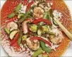  ?? DEB LINDSEY / THE WASHINGTON POST ?? Steamed shrimp and summer vegetables with gingersoy drizzle is a good change from grilled food while still showcasing seasonal produce.