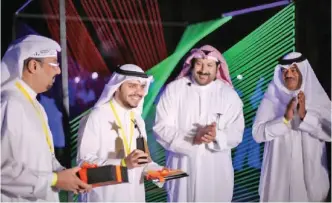  ??  ?? Photo shows Khaled Al-Sager, Fahad Al-Essa and Waleed Al-Taqi honoring Fahad Al-Najjar.