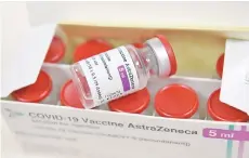  ?? — AFP file photo ?? A box containing vials of the AstraZenec­a Covid-19 vaccine is pictured at the Foch hospital in Suresnes, on the start of a vaccinatio­n campaign for health workers with the AstraZenec­a/Oxford vaccine.