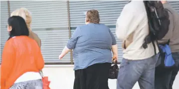  ??  ?? Obese people have shorter lives and even those who are just overweight spend more years living with heart disease than individual­s who are a healthy weight, a US study suggests.