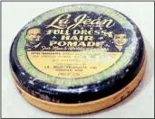  ?? Arkansas Democrat-Gazette/JOHN SYKES JR. ?? A vintage container of hair pomade helps tell the story of hair and its prominent role in black identity at “Don’t Touch My Crown,” a temporary exhibit at Mosaic Templars Cultural Center.